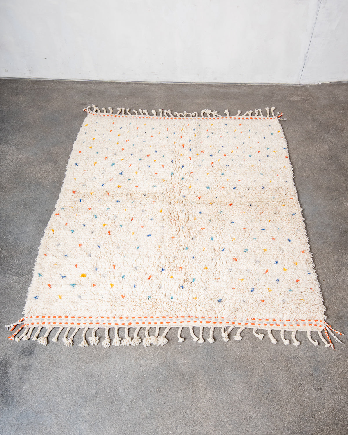 Modern, designer, handcrafted Berber rug from Morocco. Beniourain carpet with beautiful colours and patterns and fluffy wool texture.